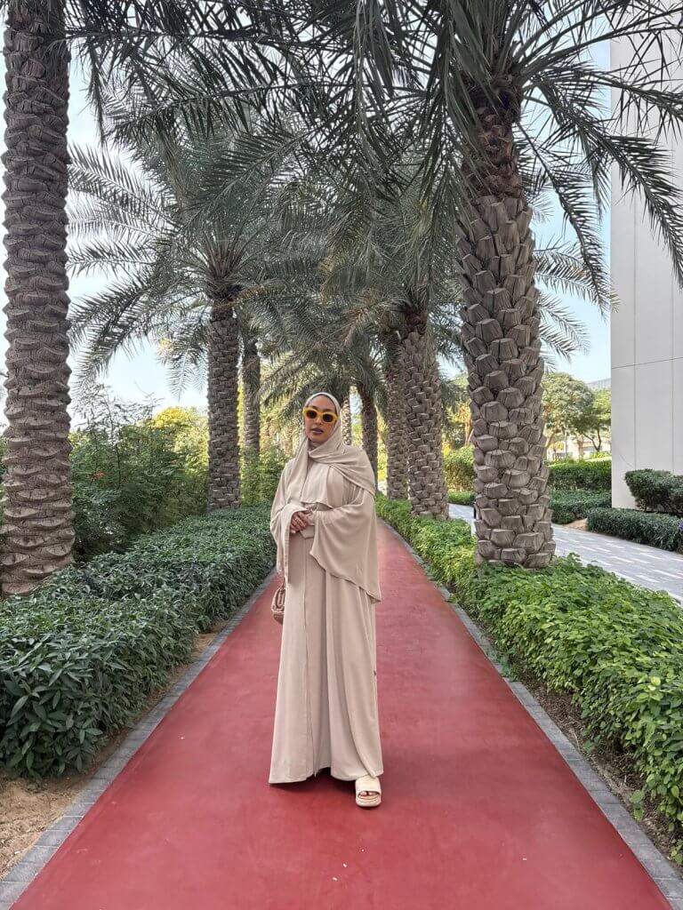 Mariah Idrissi in COS Abaya
